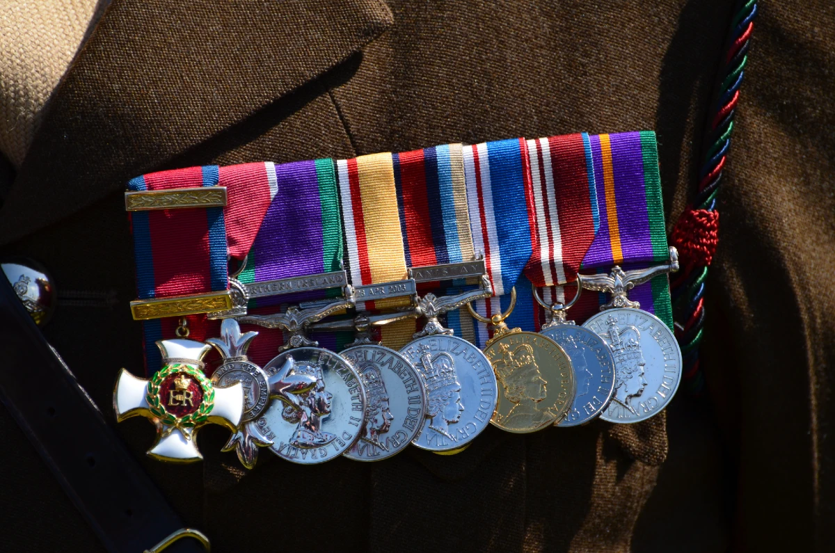 veteran showing close up of medals